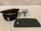 Lot of 2 military hats: black dress cap, Garrison men?s 7 1/8 cap, approx 11x5 inches.