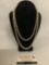 2 strings of gorgeous faux pearl necklaces, 1 marked Marvella, longest approx 22 inches