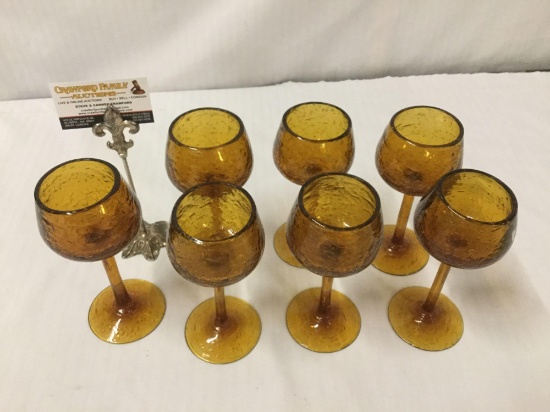 7 vintage hand made gold/Amber glass Goblets with a cracking pattern on the bottom