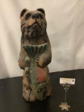 Wood carved and painted bear holding fish , approximately 25 x 9 inches