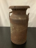 Antique metal canister, approx 11x21 inches.