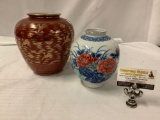 Lot of 2 Asian vases, largest approx 9x9 inches.