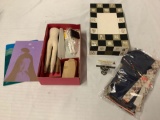 Vintage Asian cloth doll building kit with instructions and outfit, approximately 13 x 8 x 4 inches.