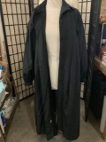 Full length women?s black dress coat, approx 15x48 inches.