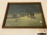 Antique framed print of a wolf in the snow overlooking small village, approximately 19 x 16 inches