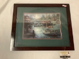 Framed boat harbor print by Nicky Boehme, approximately 22 x 18 inches.