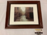 Framed photograph a figure walking in the rain in Tuscany city street, signed by artist,