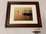 Framed photograph of boat dock in Italy, signed by artist, approximately 17 x 14 inches.