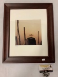 framed photograph of boat docked in Italy, signed by artist, approximately 14 x 17 inches.
