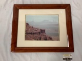 Framed landscape photograph of desert messa, approximately 24 x 20 inches.