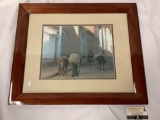 Framed photograph of Peruvian locals traveling with donkeys, approx 24x20 inches.