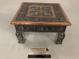 Decorative elephant stand with copper accent, approximately 9 x 5 x 9 inches. Made in India.