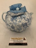 Pristine Pottery Blue ceramic teapot with cloth wrap, approximately 9 x 6 inches.