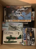 OPEN BOX LOT; collection of vintage plastic model kits which have been started and may be missing