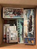 OPEN BOX LOT; collection of vintage plastic model kits which have been started and may be missing