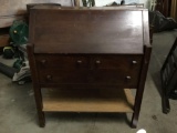 Antique Mission Style wood secretaries desk. Has one loose drawer. Key not included. Measures