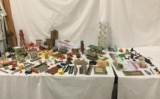 Huge lot of plastic model diorama buildings, structures, towers, and bits. Approx 26x19x17 inches.