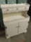 Vintage white Welsh dresser with classic rustic farmhouse aesthetic