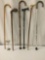 6 vintage and modern canes incl. a carved dragon head, a bamboo style cane, and more