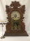 Antique oak time strike gingerbread kitchen clock with ornate floral molding & design glass front