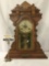 Antique eastlake period ornate mantle clock, time strike w/ peacock design glass front