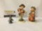 2 Goebel MI Hummel figurines - 1 MI Hummel MK5 of boy w/ violin & 1 MI Hummel MK5 boy w/ bass