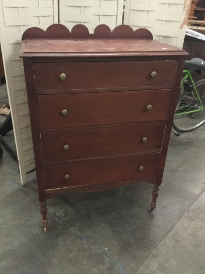 Vintage 4 drawer wood dresser with wooden casters, rich mahogany color & unique backing