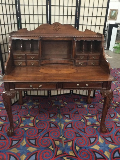 Modern antique reproduction ornate desk with claw feet, deco appearance & nice detail