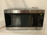 GE General Electric Co. microwave oven, model no. WES1452SS1SS, good used condition