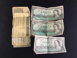 3 1954 Canadian one dollar bills and a 1941 Montgomery Ward co. 12 cent refund check
