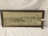 Framed tapestry depicting Oslo in wood frame - fair cond