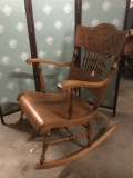 1916 pressed back rocking chair with engraved image of lion door knocker - excellent condition