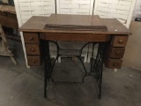 Antique singer sewing machine table with electric foot pedal modification