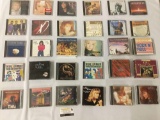 Lot of 48 country, orchestral, movie soundtracks, world, rock, and oldies CDs