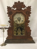 Antique oak time strike gingerbread kitchen clock with ornate floral molding & design glass front