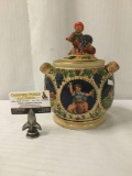 German Cookie jar decorated with scenes of German architecture & merriment - marked on bottom