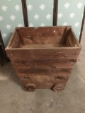 Vintage flower bed made to look like a mine cart - marked Armours 1877 on side