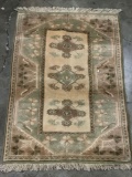 Vintage handmade C. Milas Turkish wool rug with fringe - neutral tones with floral design