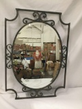 Modern round mirror with wrought iron frame