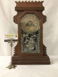 Antique Ansonia mantle clock w/ key & pendulum, late mission era carving and glass front