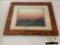Professionally framed sunset photograph approximately 17 x 14 inches.