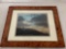 Professionally framed mountains and sky photograph approximately 17 x 14 inches.