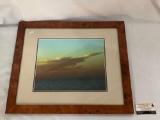 Nicely framed photograph print of clouds over the ocean approximately 23 x 19 inches