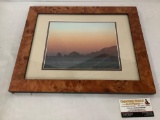 Professionally framed sunset photograph approximately 17 x 14 inches.