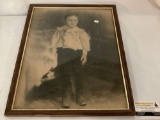 Antique framed portrait of young boy approximately 18 x 22 inches