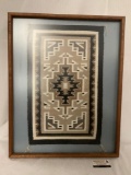 Framed Crownpoint Rig Weavers Assn. woven rug, New Mexico, approximately 23 x 29 inches.