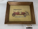 Framed fabric stitch art Locomobile 1907 by Berto , approximately 17 x 14 inches.