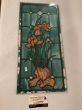 Vintage tinted glass window w/ flower design, shows wear and loss of color, approximately 10 x 22