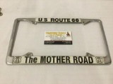 U.S. Route 66 The Mother Road chrome license plate frame. Measures approximately 12.25x6.75x0.25