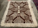 Decorative handmade shag rug with geometric neutral tone design - as is needs cleaning